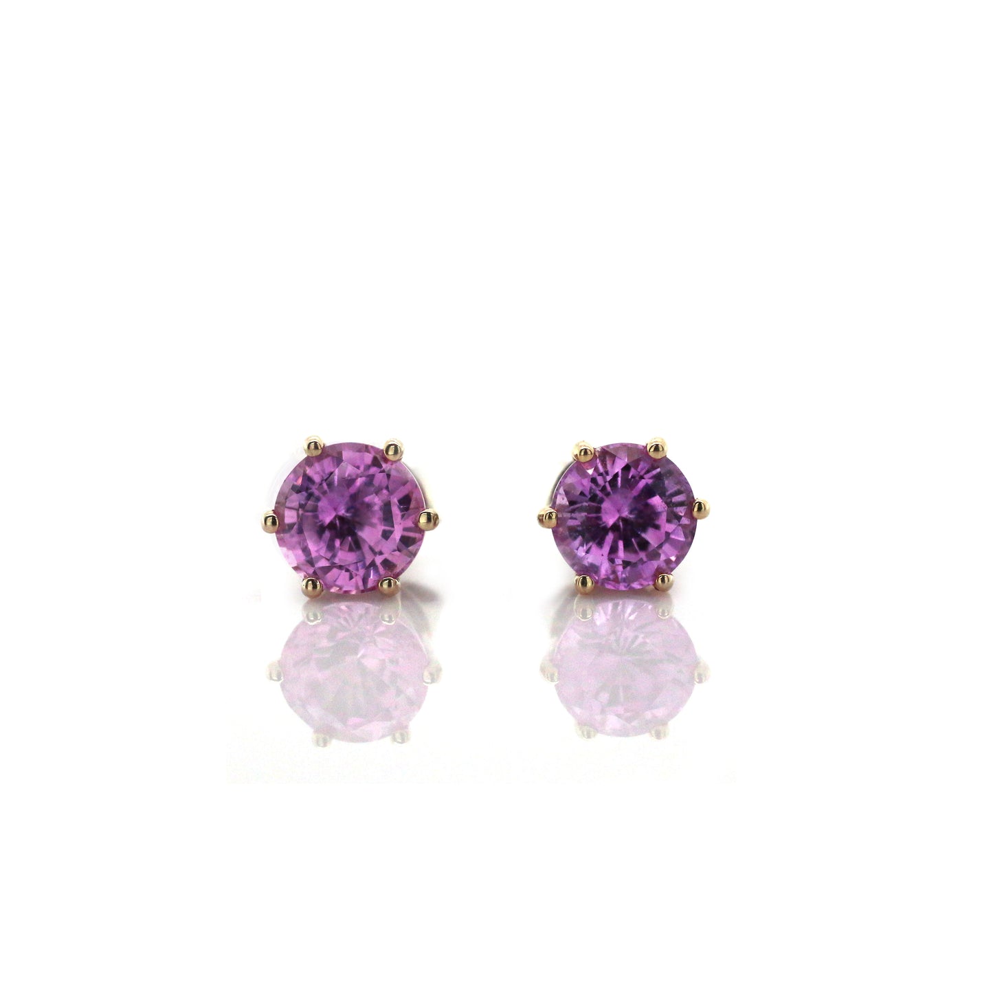 This Sparkling created Pink Sapphire Earring is Simple but Stunning