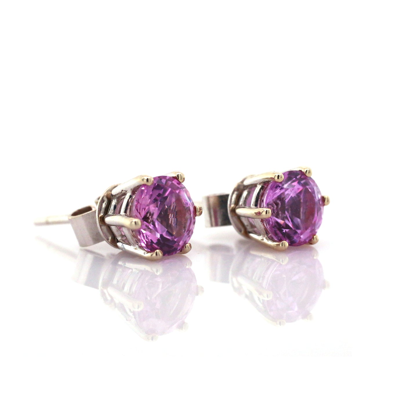 This Sparkling created Pink Sapphire Earring is Simple but Stunning