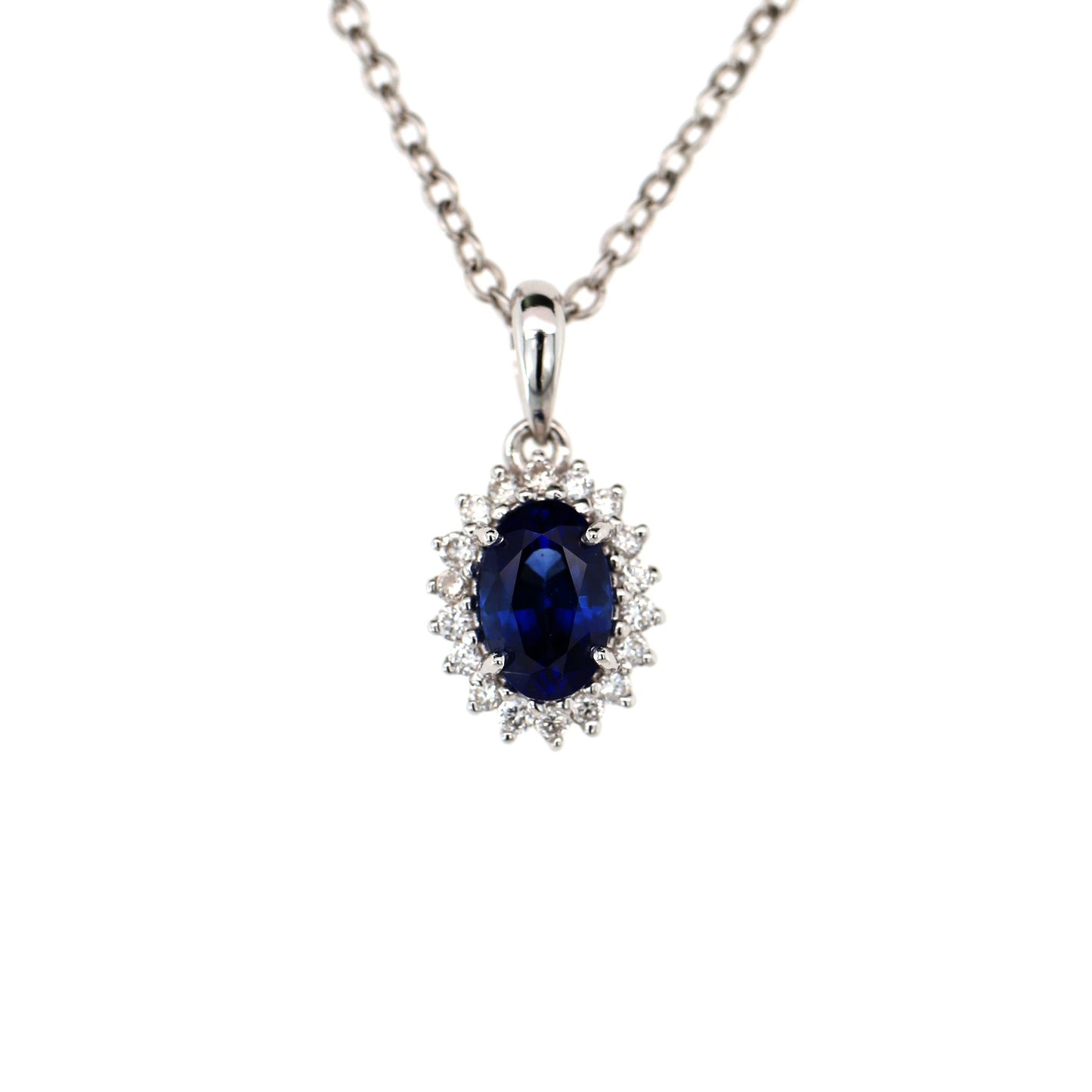 Stunning Magnificent Peice of Pendant Elaborated with Blue Sapphire Beauty is enhanced by addition of White Diamond