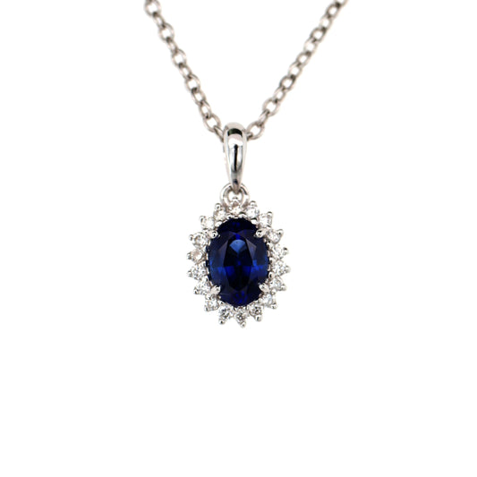 Stunning Magnificent Peice of Pendant Elaborated with Blue Sapphire Beauty is enhanced by addition of White Diamond