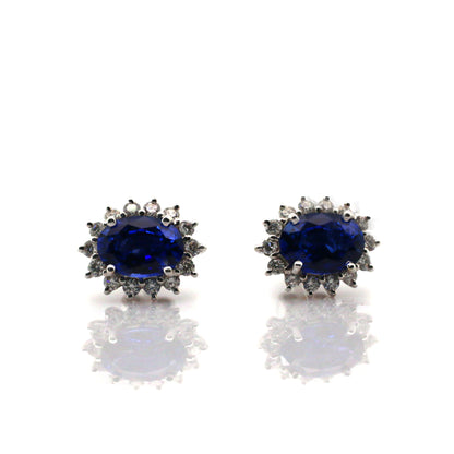 Blue sapphire earrings in 18K white gold