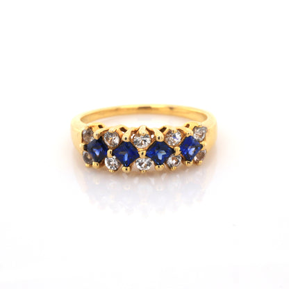 White sapphire and Blue sapphire ring in 18K yellow gold