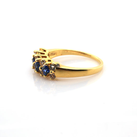 White sapphire and Blue sapphire ring in 18K yellow gold