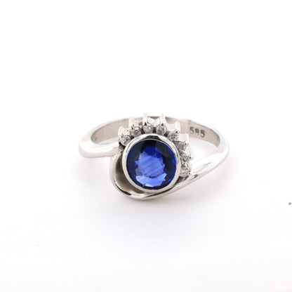 Blue sapphire and diamond stud ring in 14K white gold