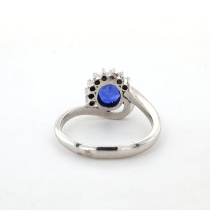 Blue sapphire and diamond stud ring in 14K white gold