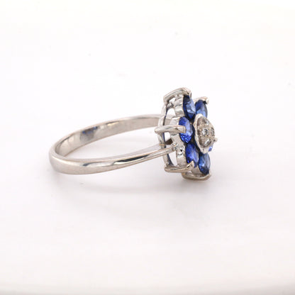 Blue sapphire and diamond cluster ring in 18K white gold