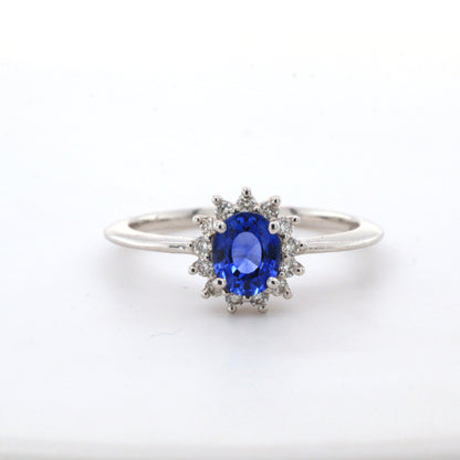 Blue sapphire and diamond cluster ring
