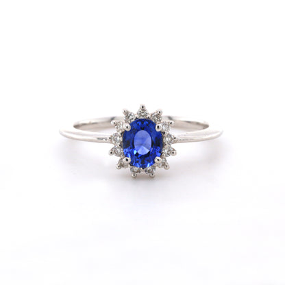 Blue sapphire and diamond cluster ring