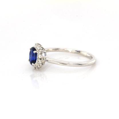Blue sapphire and diamond cluster ring in 18K white gold