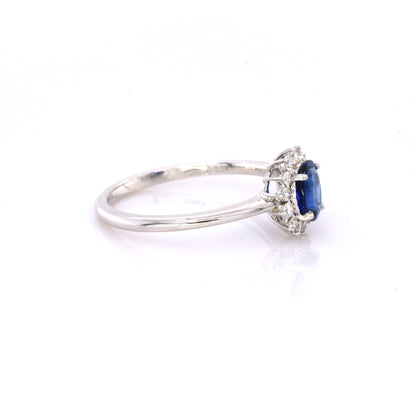 Blue sapphire and diamond cluster ring in 18K white gold