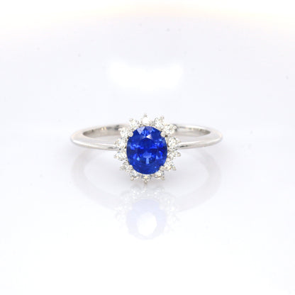 Blue sapphire and diamond cluster ring in 18K white gold