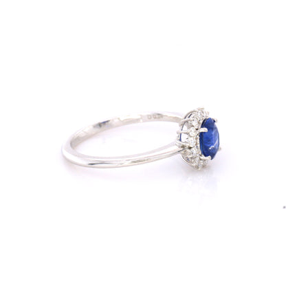 Blue sapphire and diamond cluster ring in 18K white gold