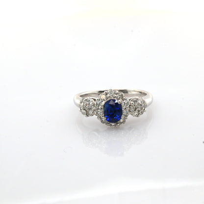 Blue sapphire and diamond cocktail stud ring in 18K white gold