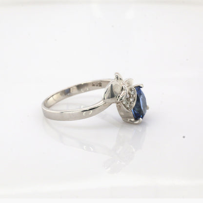 Blue sapphire and diamond ring in 14K white gold