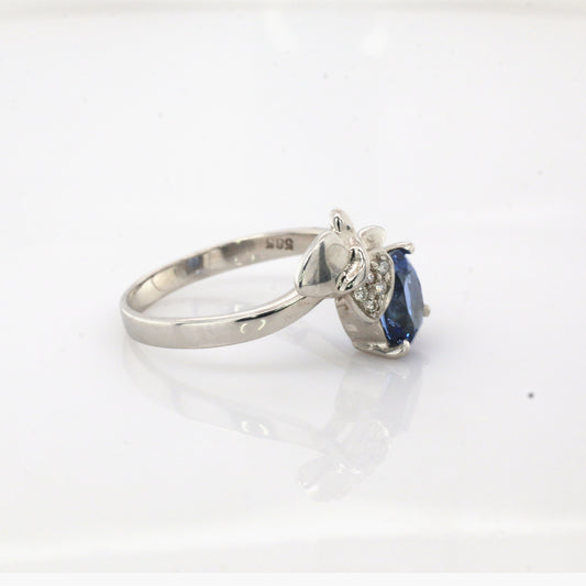 Blue sapphire and diamond ring in 14K white gold