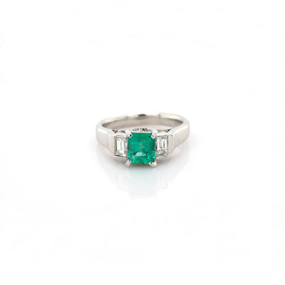 diamond and emerald ring in 950 platinum