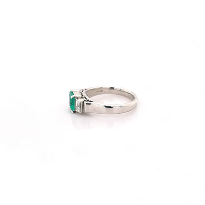 diamond and emerald ring in 950 platinum