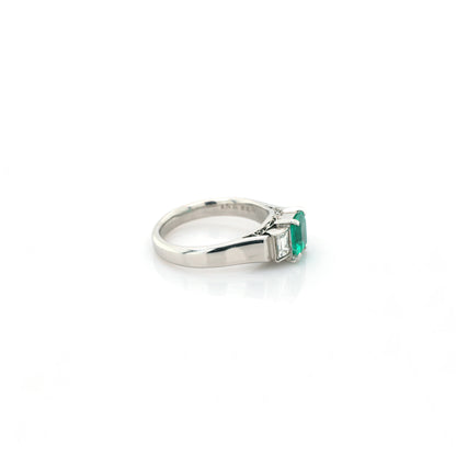 diamond and emerald ring in 950 platinum