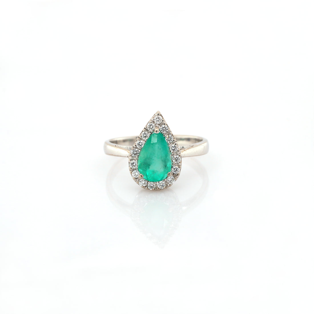 diamond and emerald ring in 18K white gold