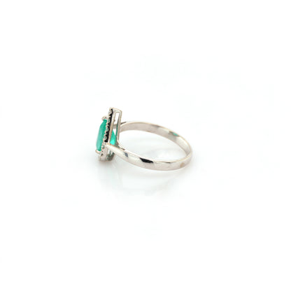 diamond and emerald ring in 18K white gold