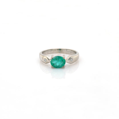 diamond and emerald ring in 18K white gold