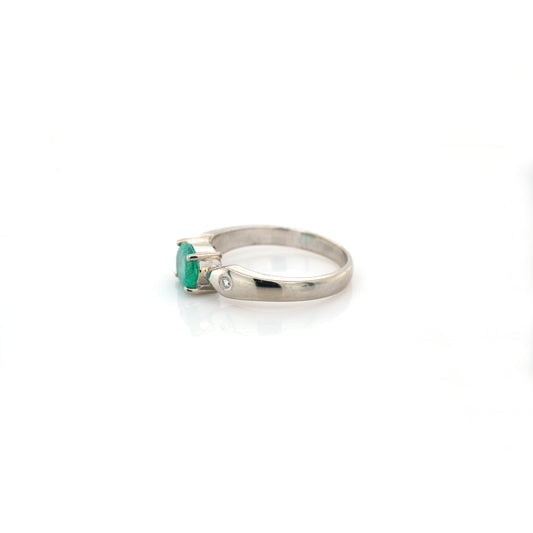diamond and emerald ring in 18K white gold