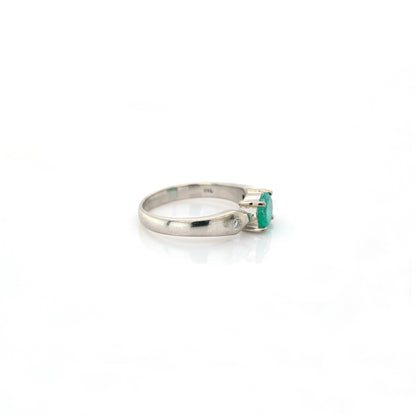 diamond and emerald ring in 18K white gold