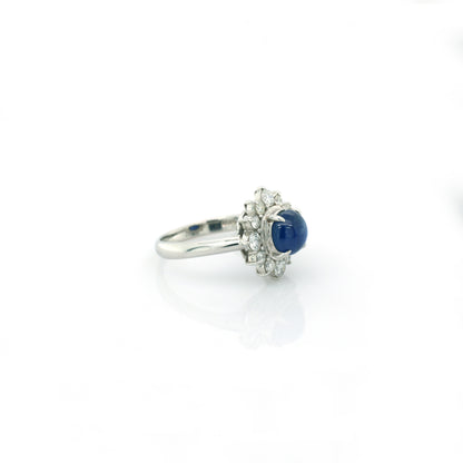 Blue star sapphire and diamond ring in 950 platinum