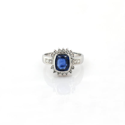 Blue sapphire and diamond ring in 18K white gold