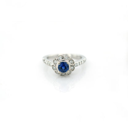 Blue sapphire and diamond floral ring in 18K white gold