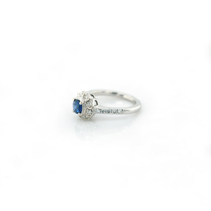 Blue sapphire and diamond floral ring in 18K white gold