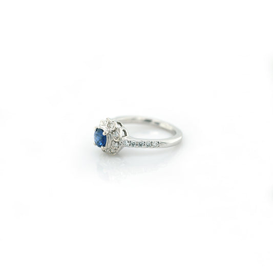 Blue sapphire and diamond floral ring in 18K white gold
