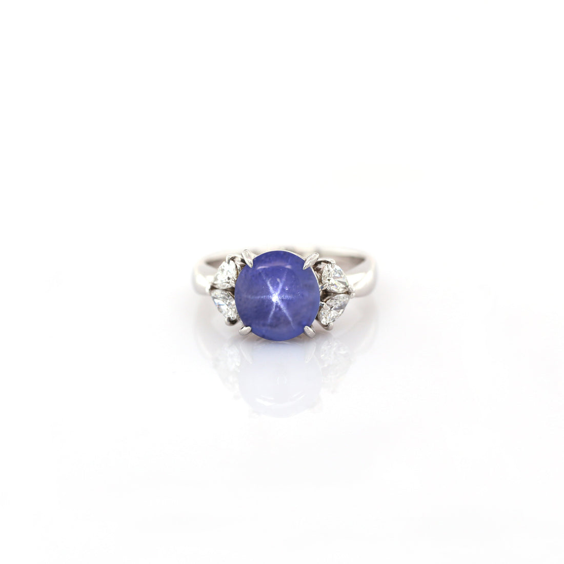 Blue star sapphire and diamond ring in 950 platinum