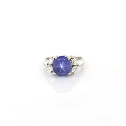 Blue star sapphire and diamond ring in 950 platinum