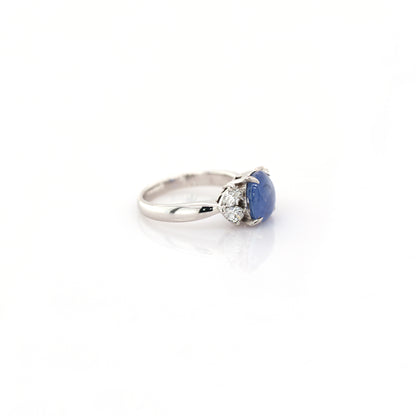 Blue star sapphire and diamond ring in 950 platinum