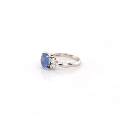 Blue star sapphire and diamond ring in 950 platinum