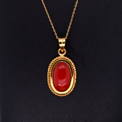 red coral pendant in 18K yellow gold