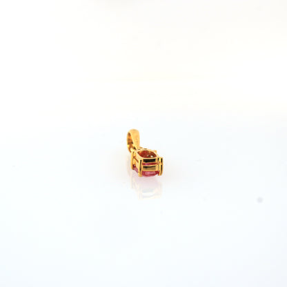 Pink sapphire pendant in 14K yellow gold
