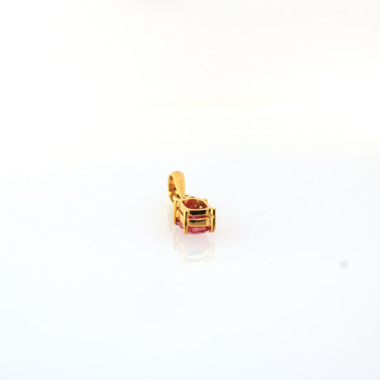Pink sapphire pendant in 14K yellow gold