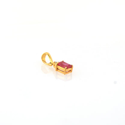 Pink sapphire pendant in 14K yellow gold