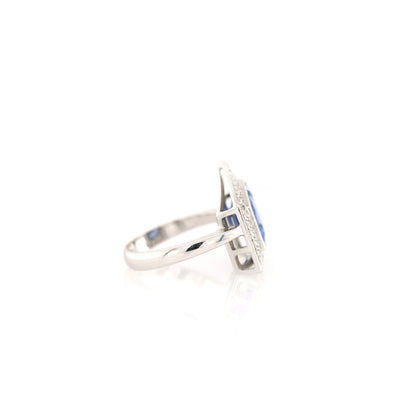 Blue sapphire and diamond stud ring in 18K white gold