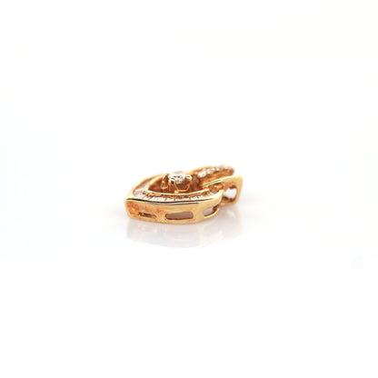 diamond pendant in 18K yellow gold