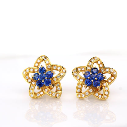 Blue sapphire and diamond earrings in 18K yellow gold