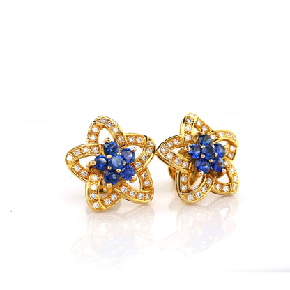 Blue sapphire and diamond earrings in 18K yellow gold