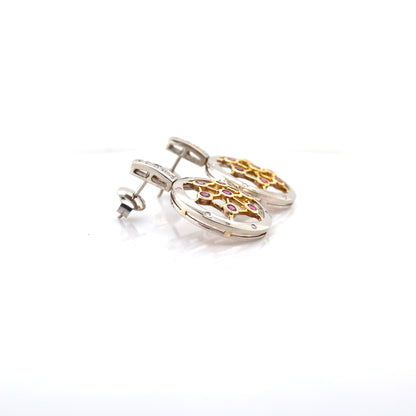 Pink sapphire and diamond earrings in white and yellow gold