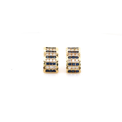Blue sapphire and diamond earrings in 14K yellow gold