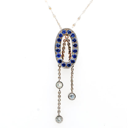 White sapphire and Blue sapphire pendant in 18K white gold