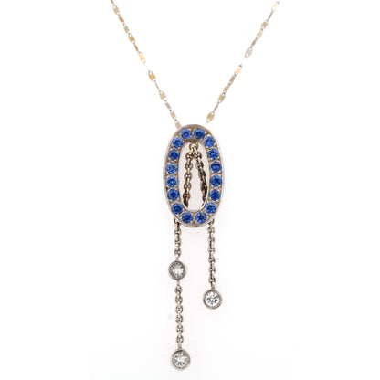 White sapphire and Blue sapphire pendant in 18K white gold