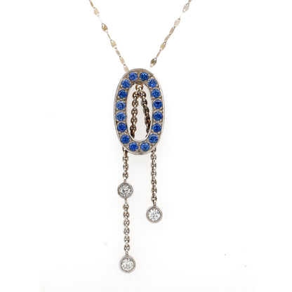 White sapphire and Blue sapphire pendant in 18K white gold