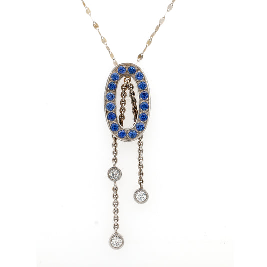 White sapphire and Blue sapphire pendant in 18K white gold